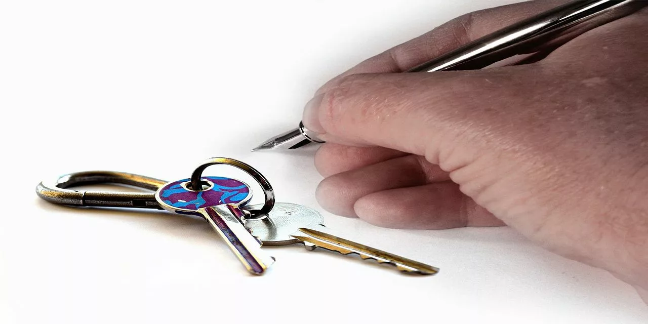 Landlord tenancy agreement key hand lease house keys tenant signaturepen