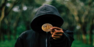 bitcoin coin hoodie mysterious man money