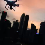 Flying a drone at dusk in the city
